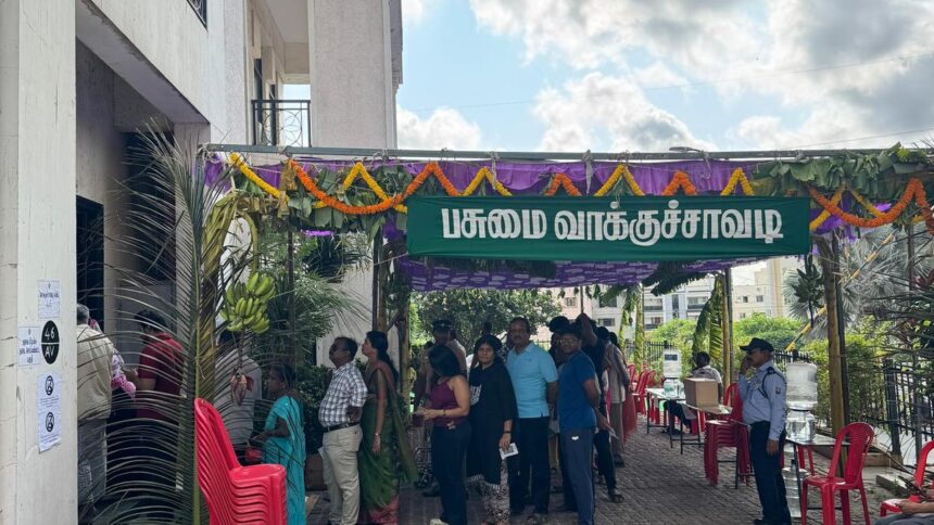 Voting made easy with polling booths within gated community