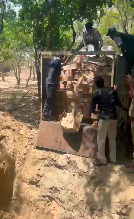 नोएडा में अवैध शराब पर एक्शन: हजारों लीटर शराब पर चला बुलडोजर; प्रशासन सख्त